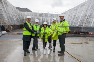 Marking completion of excavation works of the waste bunker are (l-r) Huw Jones, Oxfordshire county council director for environment and economy; Councillor Keith Mitchell, leader of Oxfordshire county council; Councillor Lorraine Lindsey-Gale, cabinet member for growth and infrastructure; Colin Drummon, Viridor chief executive; and Mark Burrows-Smith, Viridor operations director